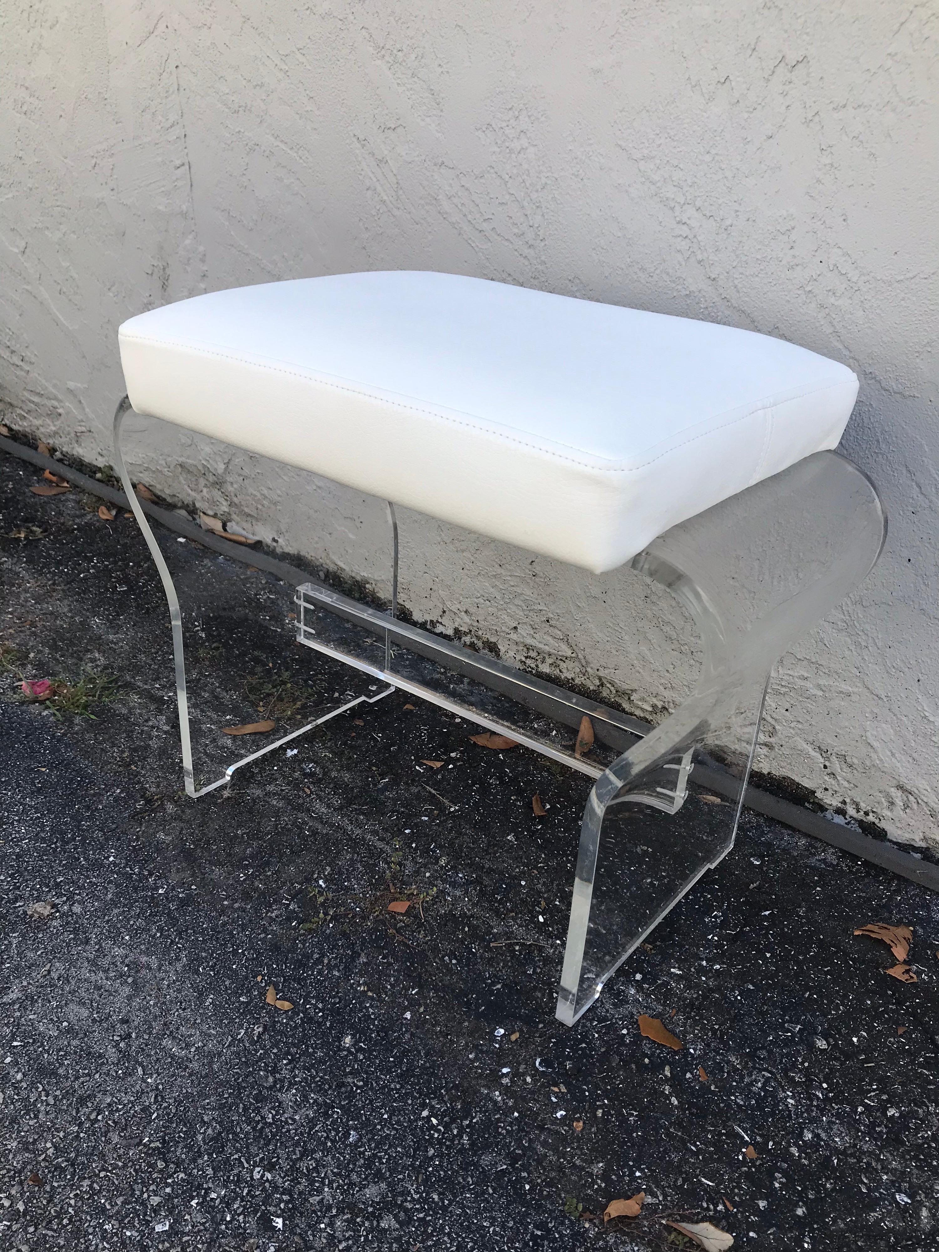 Mid century curved lucite vanity stool with white vinyl leather seat cushion by Charles Hollis Jones.