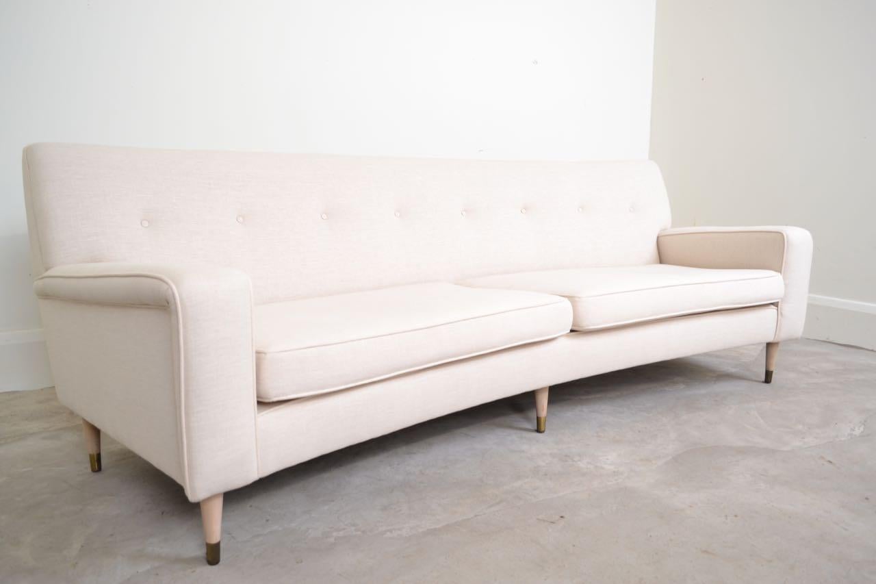 American Curved Midcentury Sofa Upholstered in Natural Linen For Sale