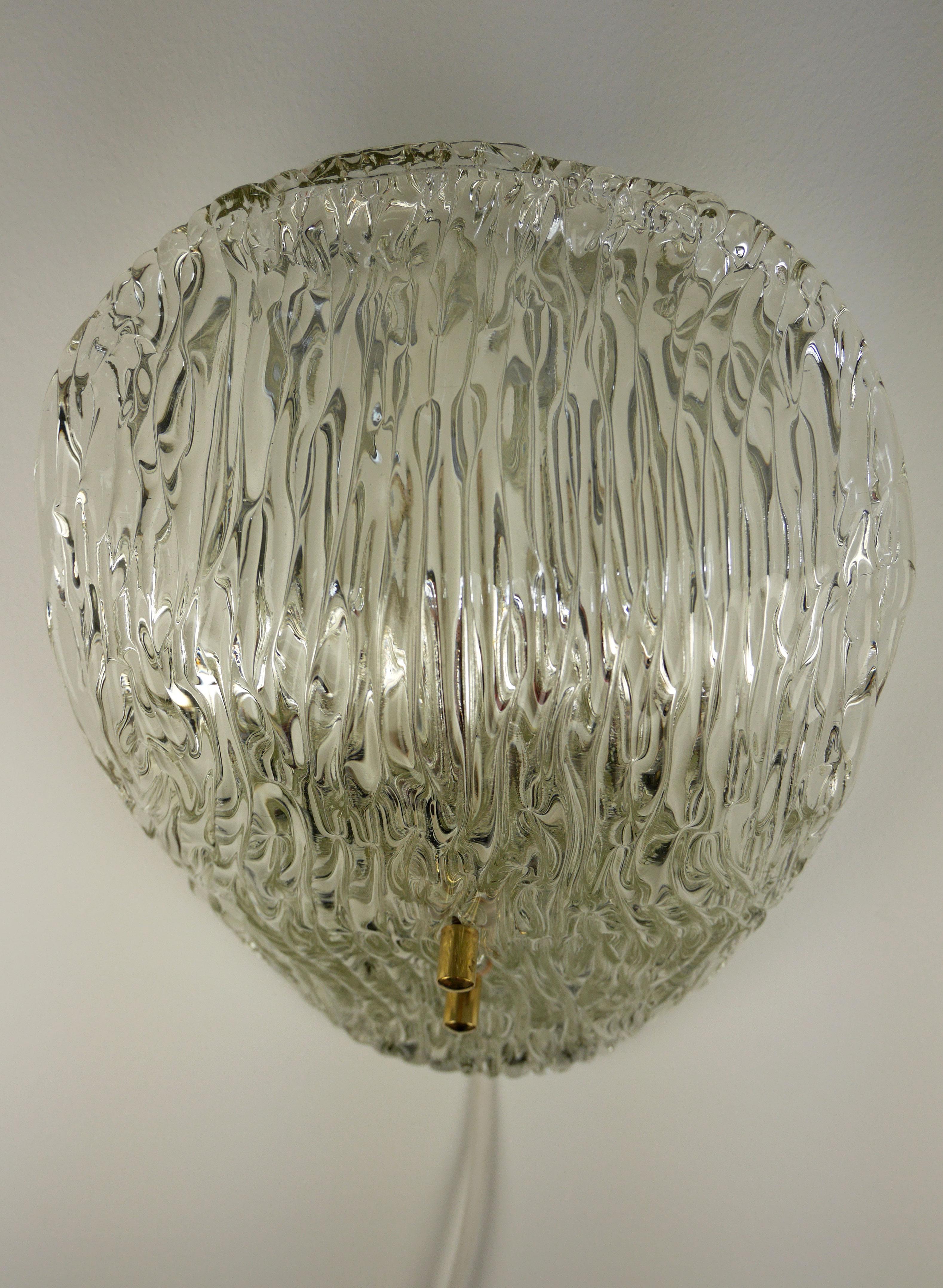 curved glass wall sconce