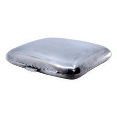 Curved, perforated silver cigarette case with a gold interior and a hinged lid