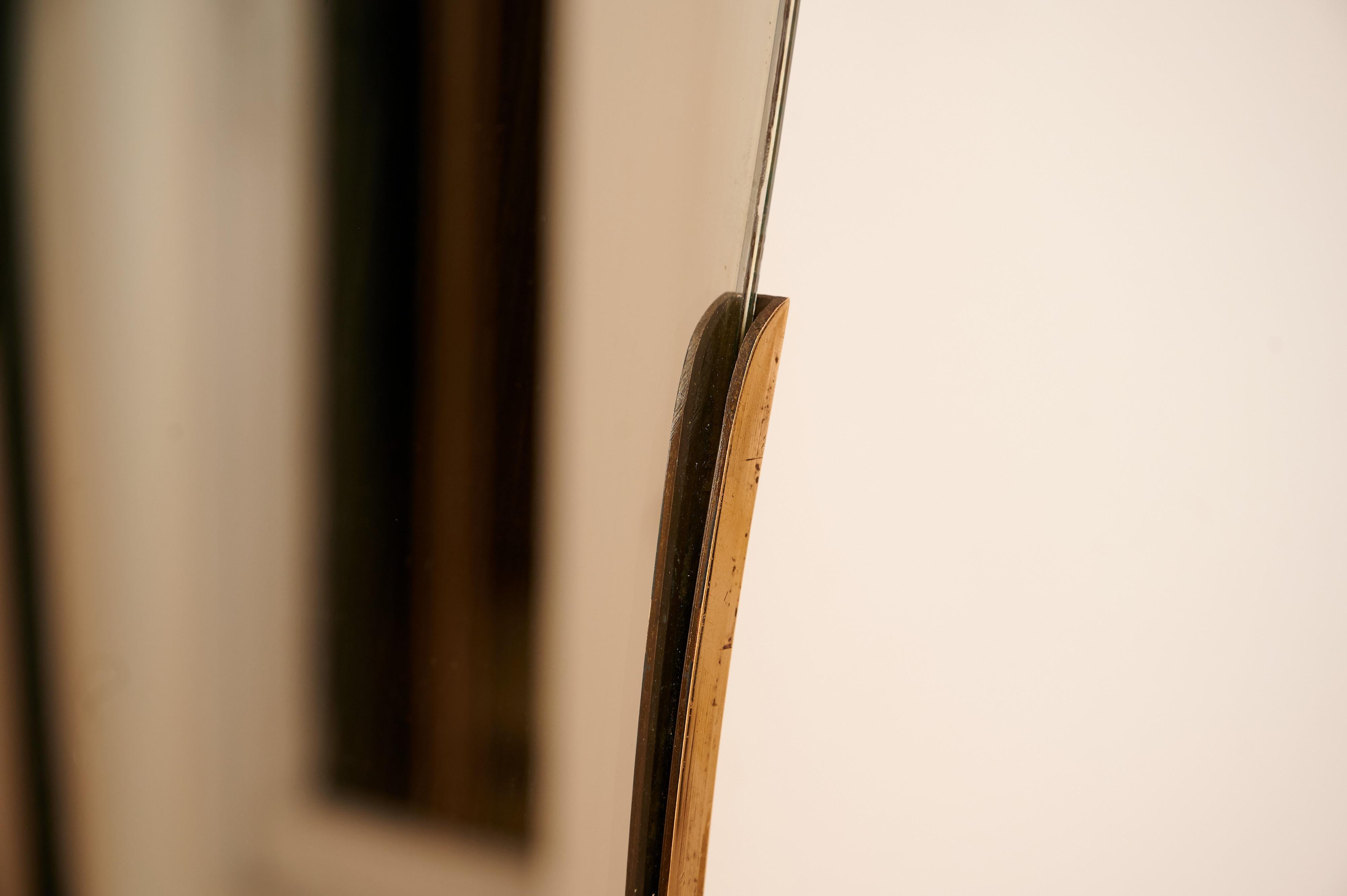 Mid-Century Modern Curved Ponti Style Half Brass Mirror For Sale