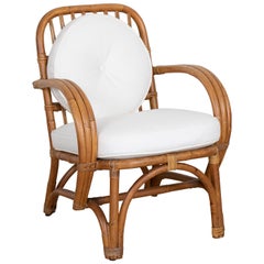 Curved Rattan and Linen Armchair