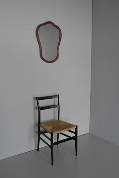 Gebogener skulpturaler Wandspiegel aus Holz, Italien 1960er Jahre