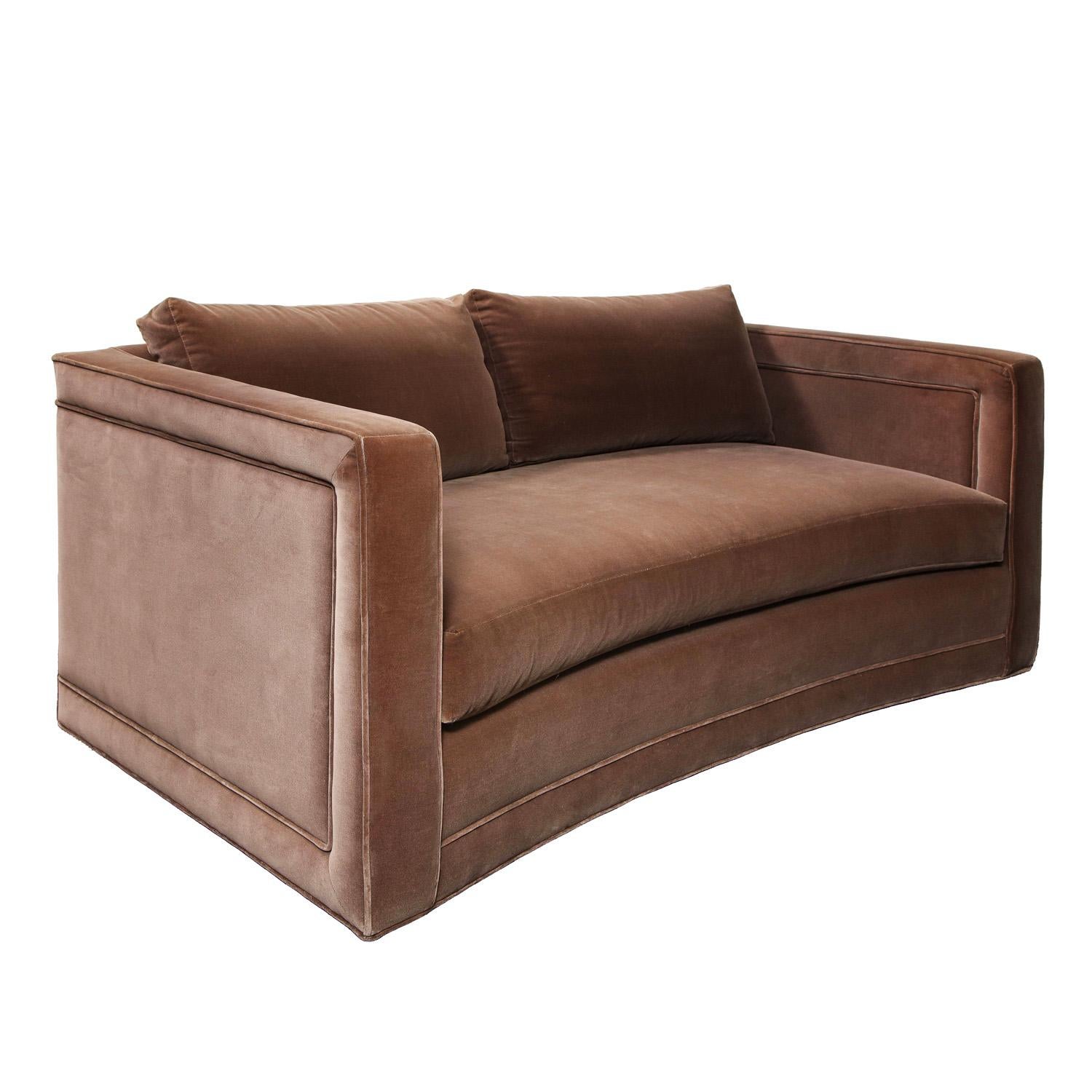 Elegant gently curved sofa in mocha color cotton velvet.  The upholstery has some small blemishes and stains consistent with age and use.

