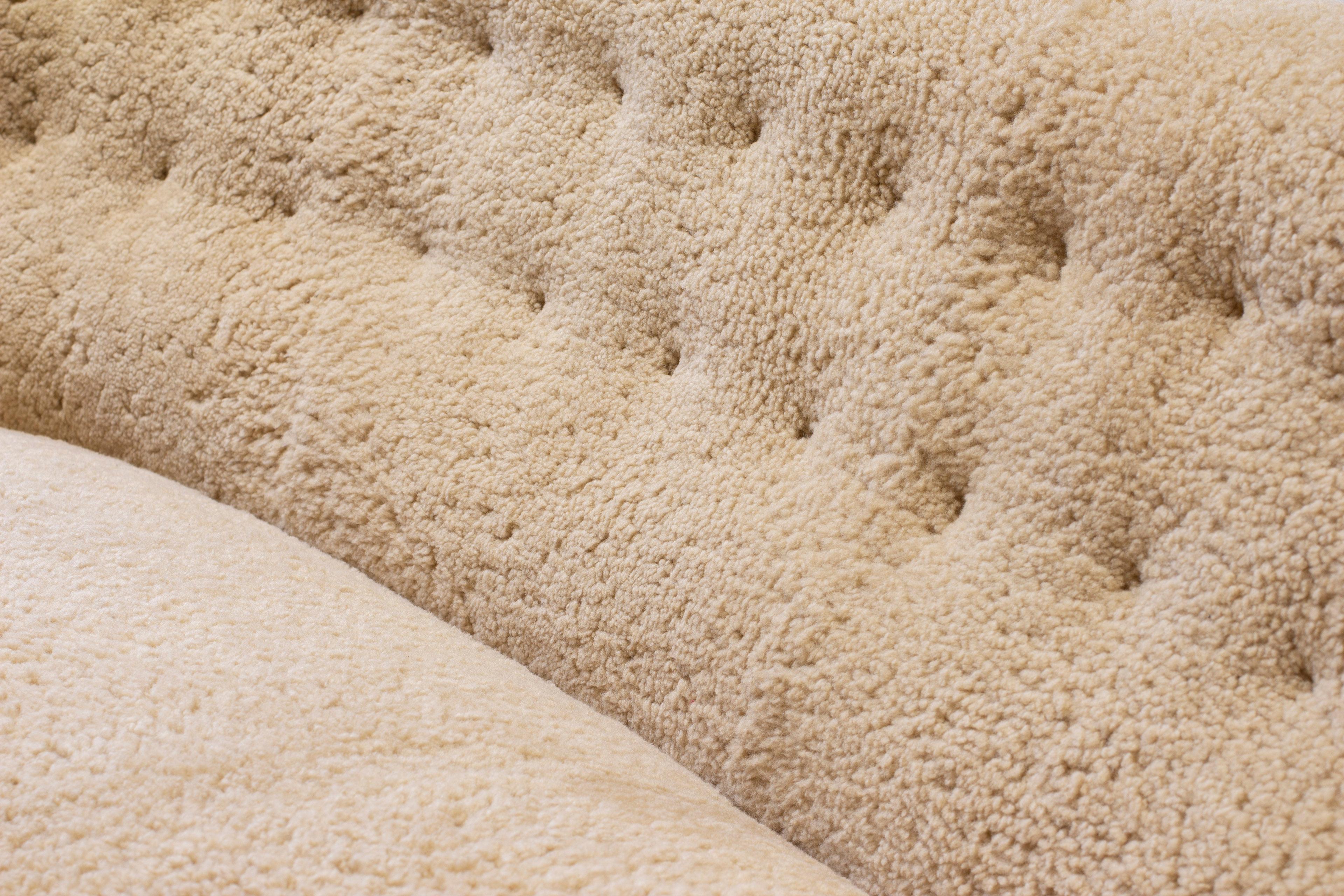 Sheepskin Curved sheeps skin sofa model Fritz Hansen FH 1669, FDB production 1950s For Sale