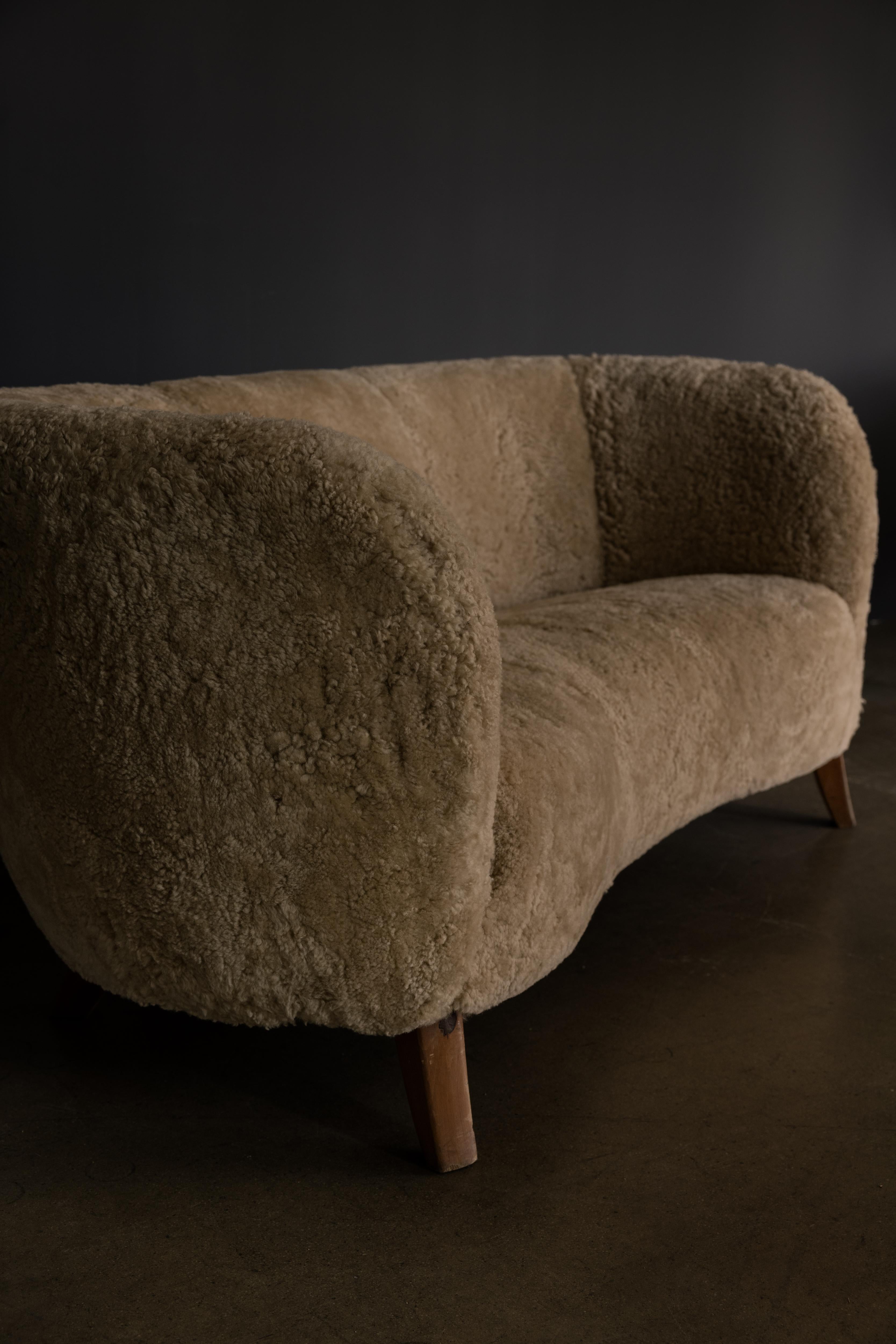 Curved Sheepskin Sofa In Good Condition For Sale In Los Angeles, CA