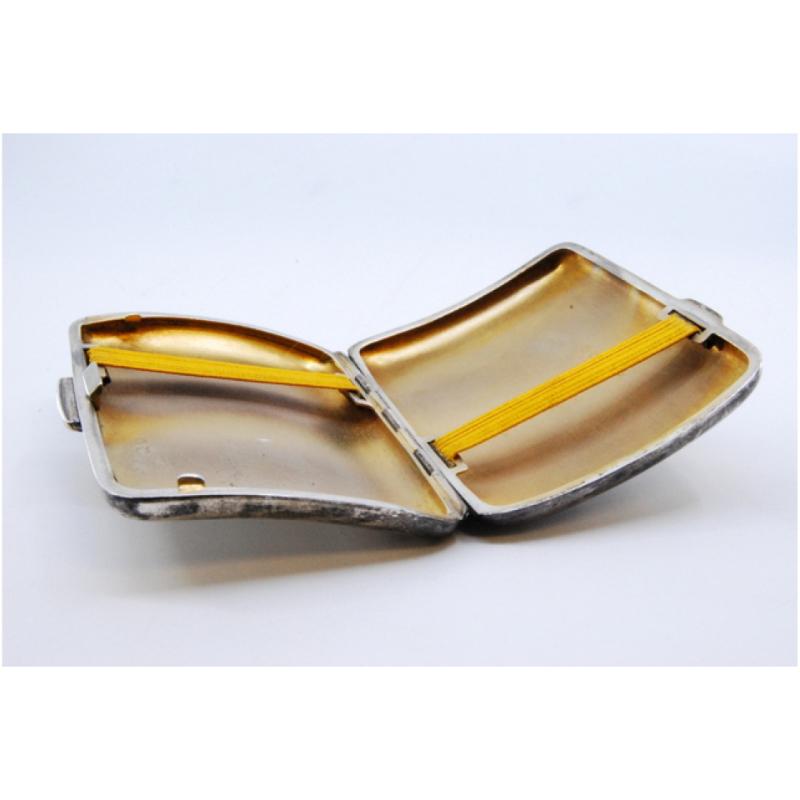 European Curved silver cigarette case w/ guilloche engraving, gold interior & hinged lid For Sale