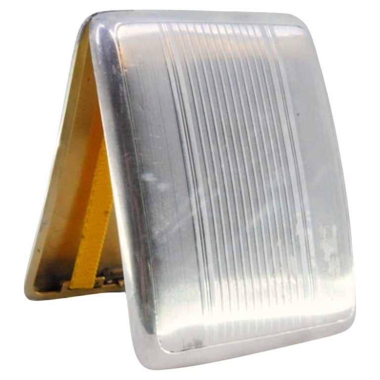 Curved silver cigarette case w/ guilloche stripes, gold interior and hinged  lid For Sale at 1stDibs