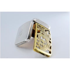 Curved silver-gold vinaigrette box, smooth on both sides, George III period