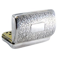 Curved silver-gold vinaigrette box with engraved lid, George III period