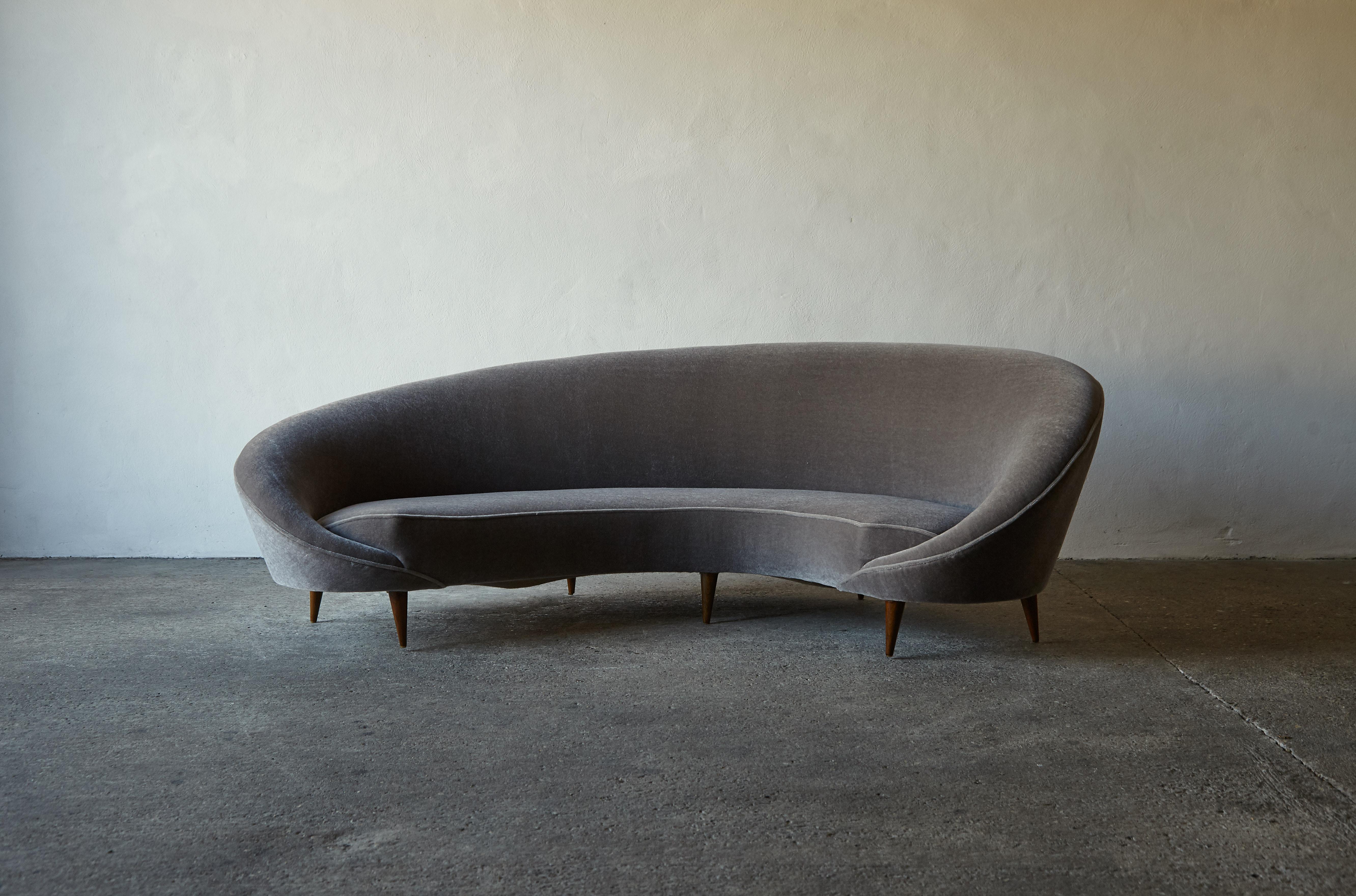 An curved comma sofa, attributed to Ico Parisi / Federico Munari, Italy. Newly reupholstered in pure mohair fabric. 


