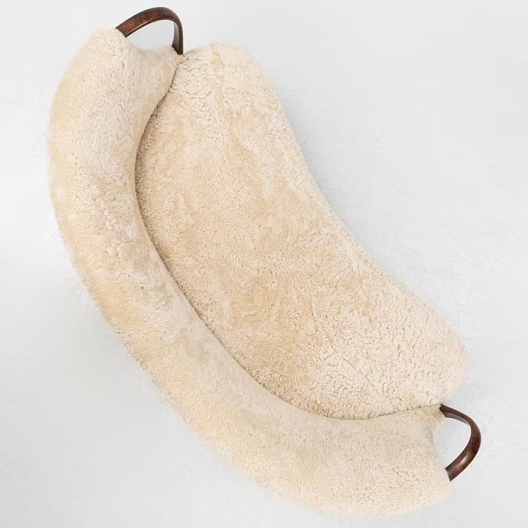 Curved sofa attributed to Viggo Boesen with sheepskin Model 96 In Good Condition For Sale In New York, NY