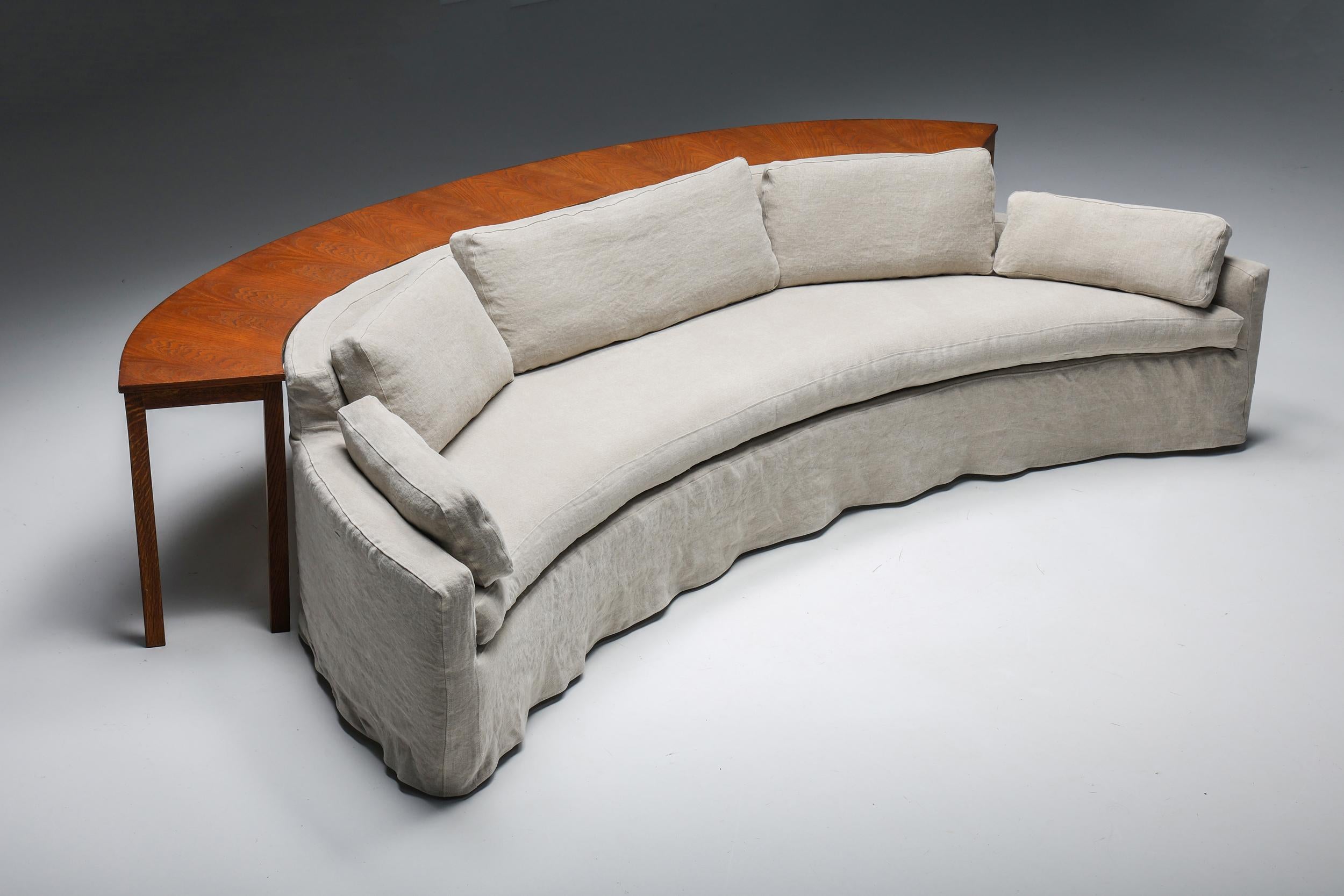 Curved Sofa; Adrian Pearsall; USA; American Design; Mid-Century Modern; Walnut: Settee; Baker Furniture, USA, 1950s.

This rare sofa in the style of American designer Adrian Pearsall was manufactured by Baker Furniture in the USA in the 1950s.