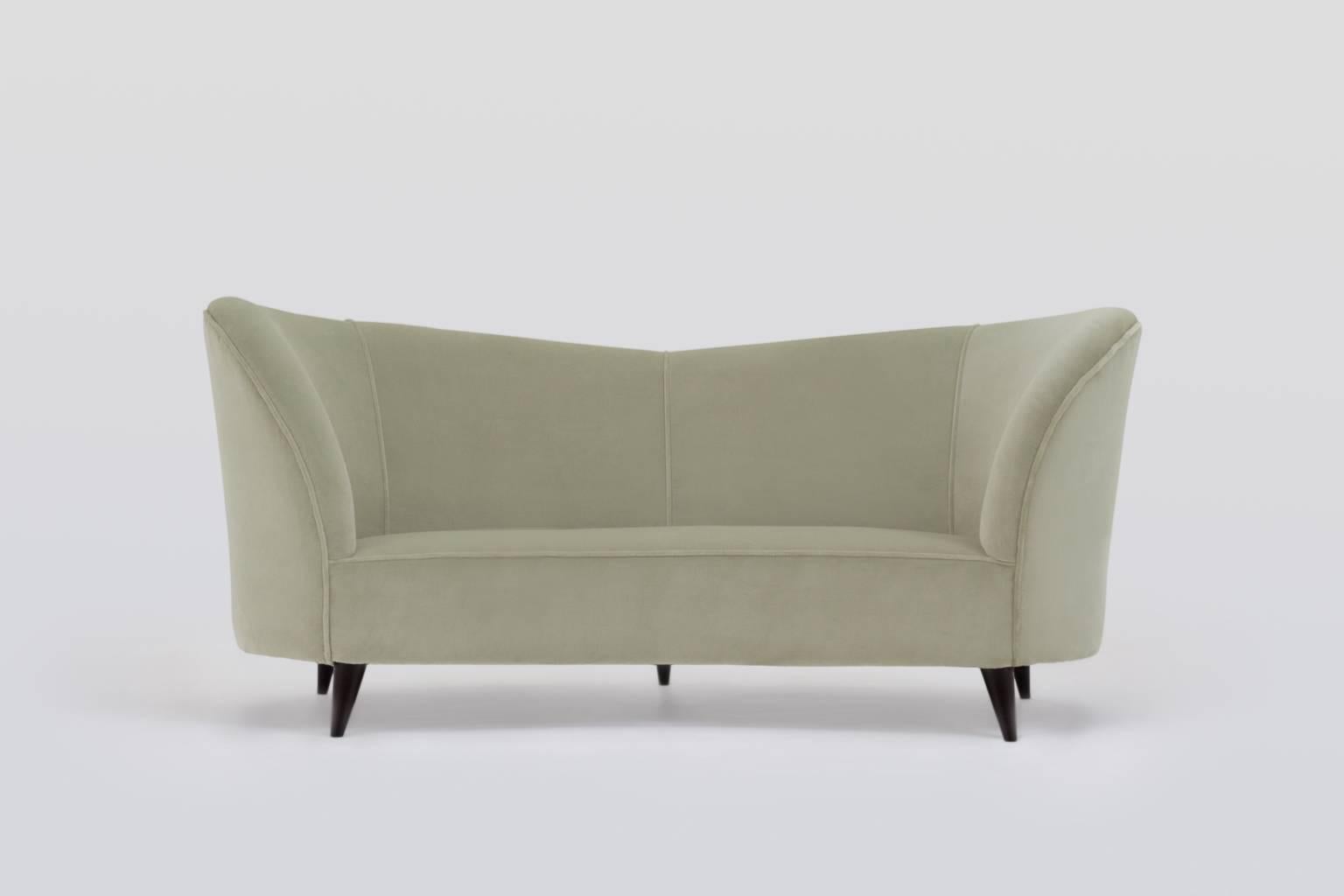 Curved sofa by Cesare Lacca, Italy, 1950s. The sofa is reupholstered with a luxurious silk and cotton velvet from the collection of Pierre Frey with an exceptional soft feel. Very elegant and comfortable sofa cause of the spring seat area and the