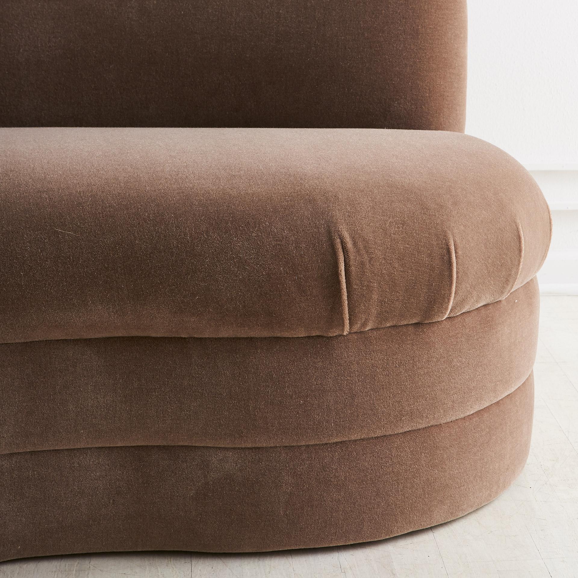 brown curved sofa