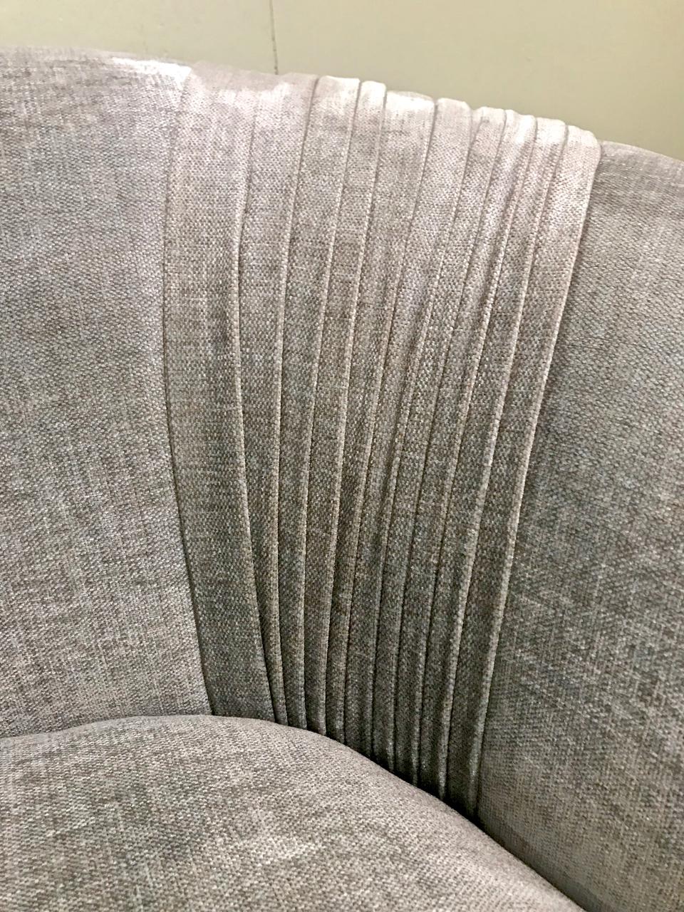 This is a beautifully fabricated curved small sofa. The top quality blue-gray chenille upholstery is in pristine condition and features fine ruching at the sofa's curves, down-wrapped seat cushion and top quality foam. Please see detail photos.