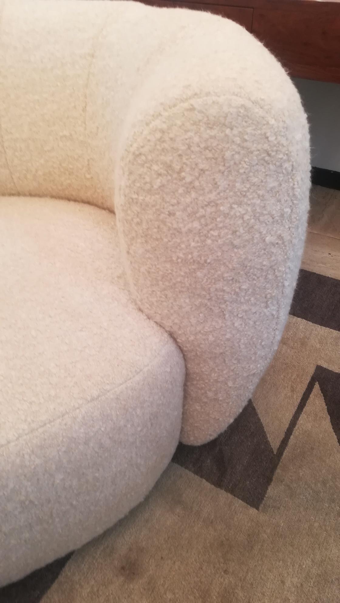 beige curved sofa