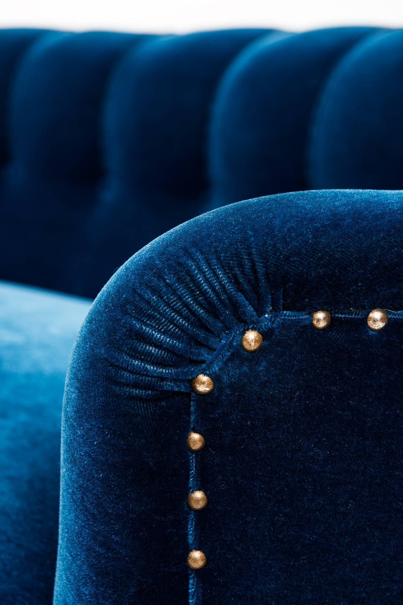 blue curved sofa
