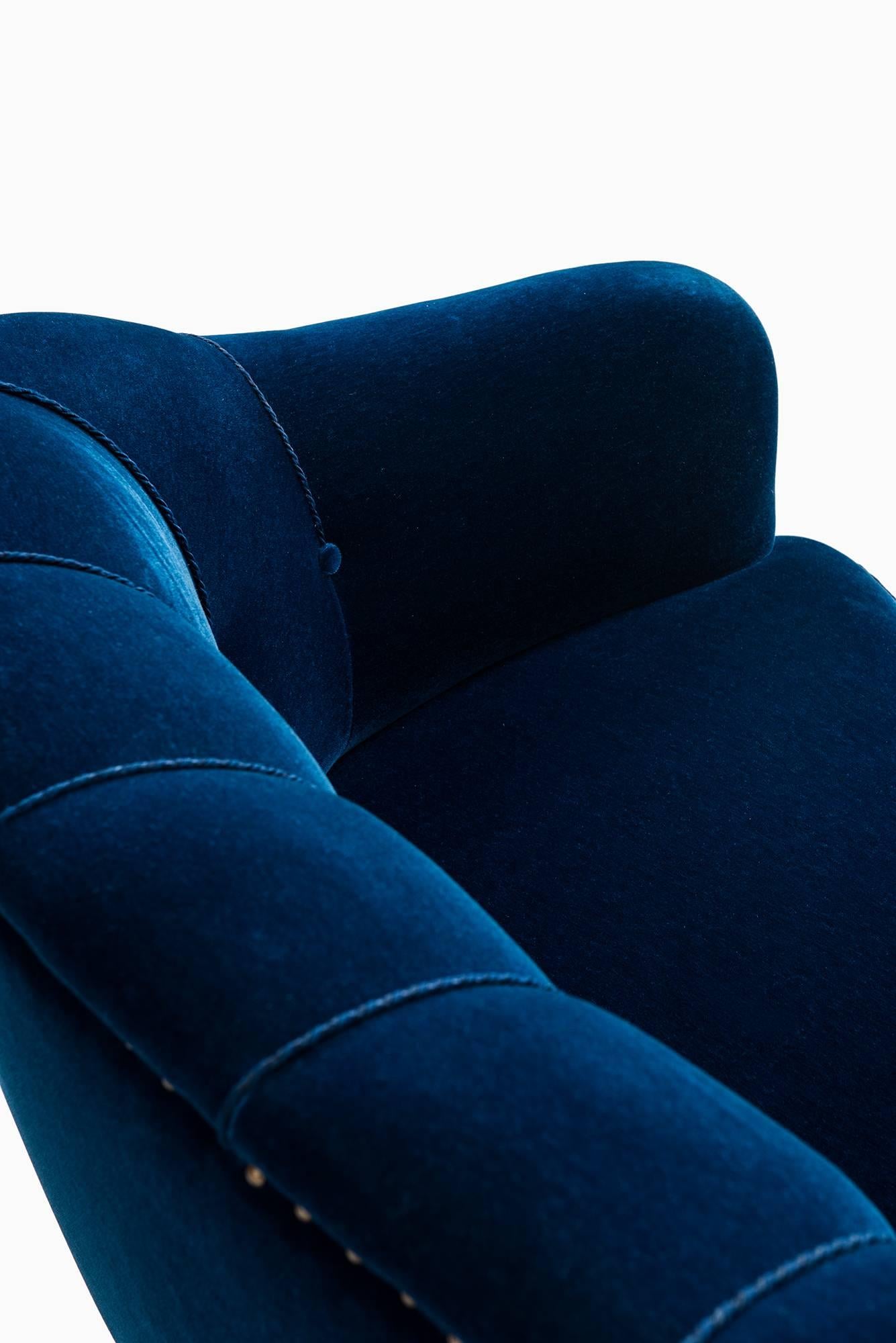 curved blue sofa