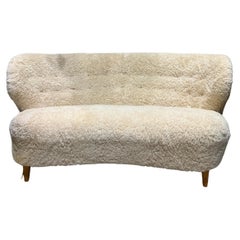 Antique Curved sofa in sheepskin Finland circa 1940 