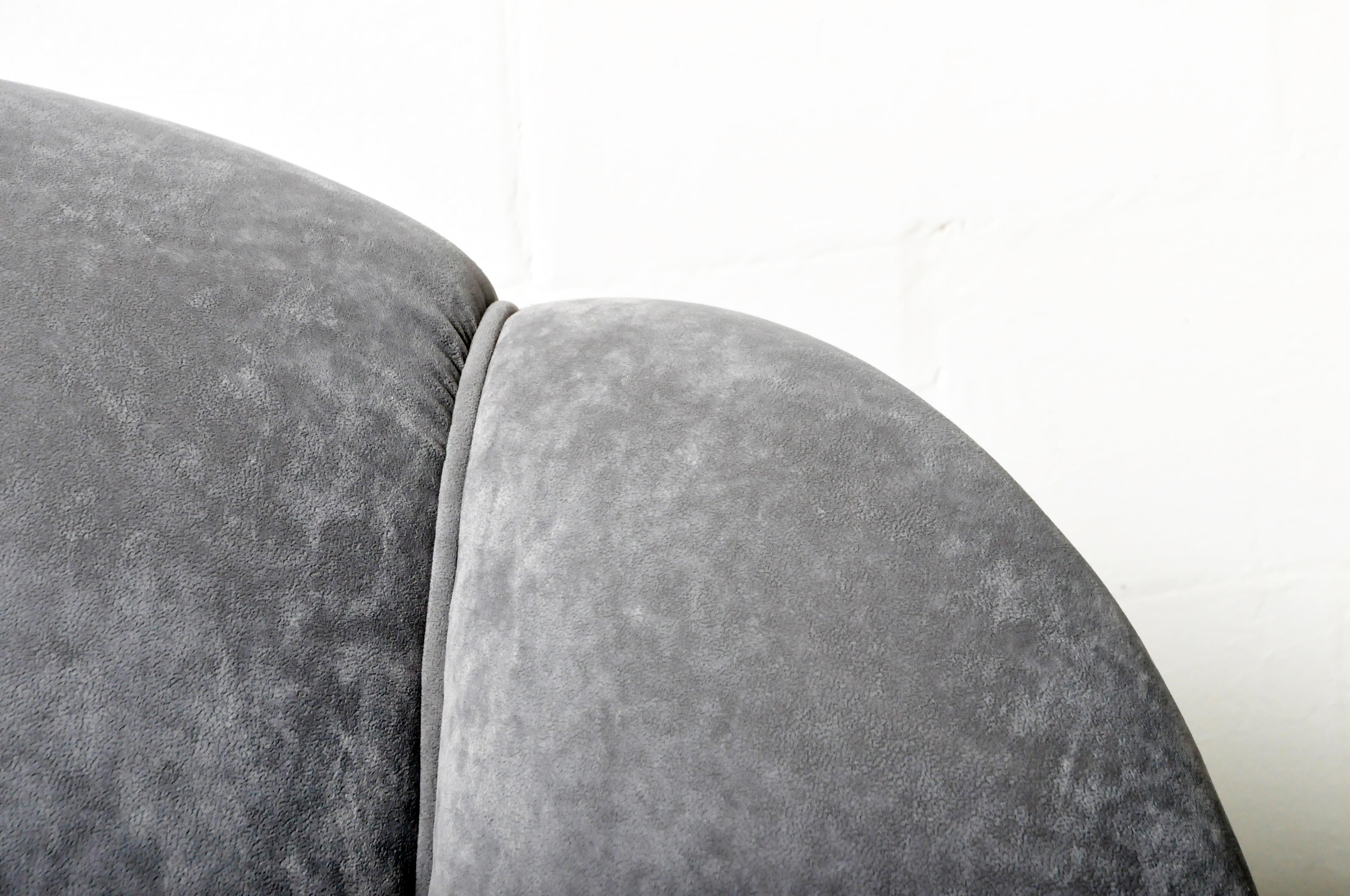 Contemporary Curved Sofa with Rolled and Tufted Back