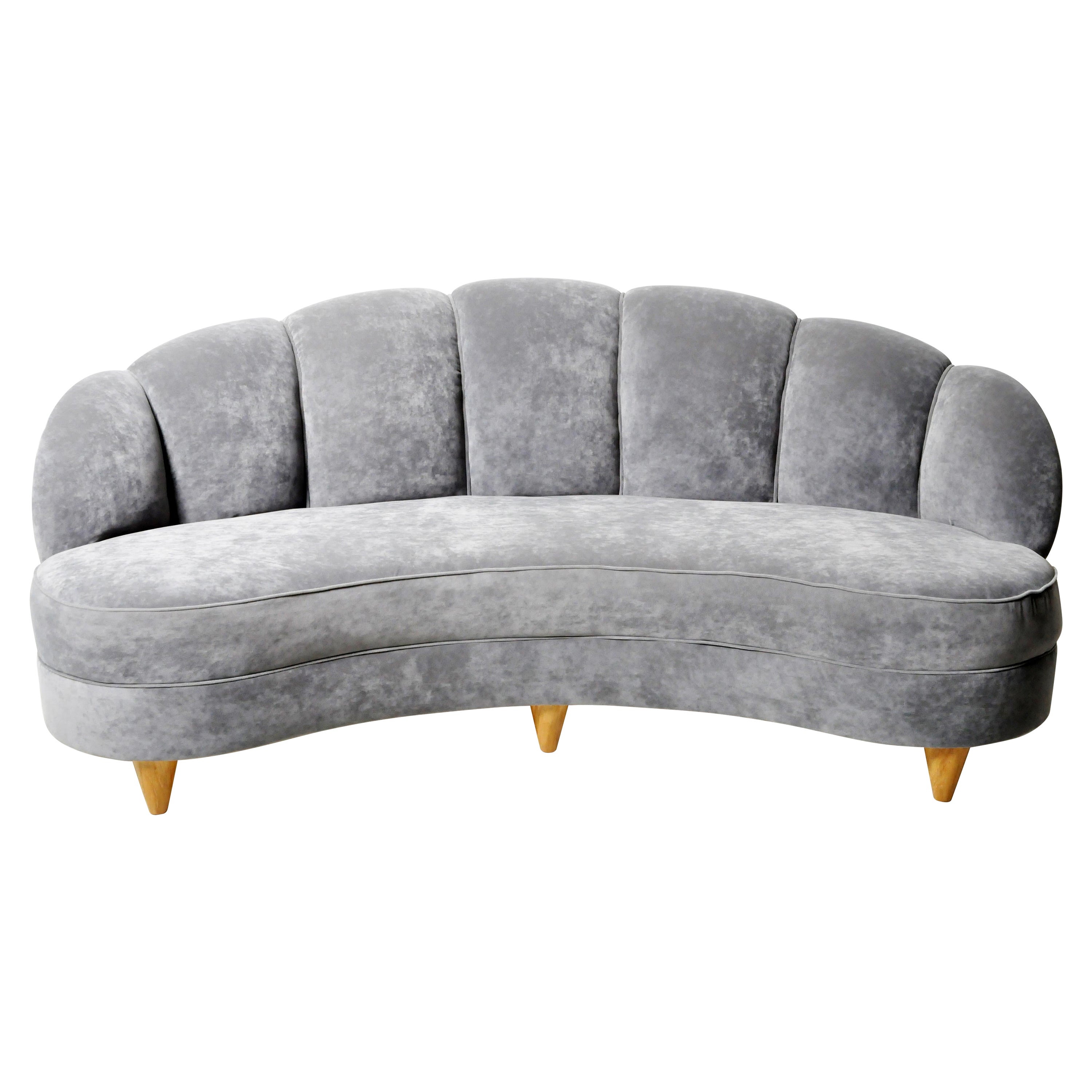 Curved Sofa with Rolled and Tufted Back