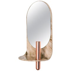 Curved Stone Wall Mirror with Bronze Vase