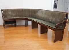 Curved upholstered bench