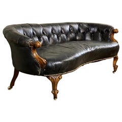 Antique Curved Victorian Sofa, Carved Walnut and Leather