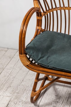 Curved Wicker Settee With Newly Upholstered Green Waxed Canvas Cushion