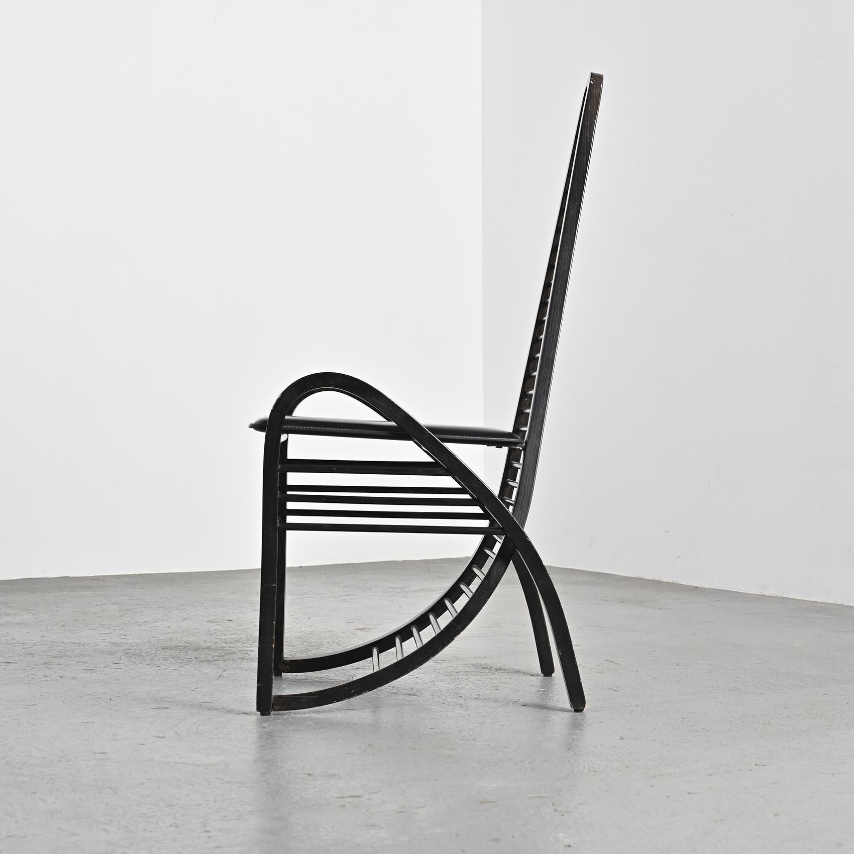 Italian Curved wooden armchair, Siabu Italy circa 1970