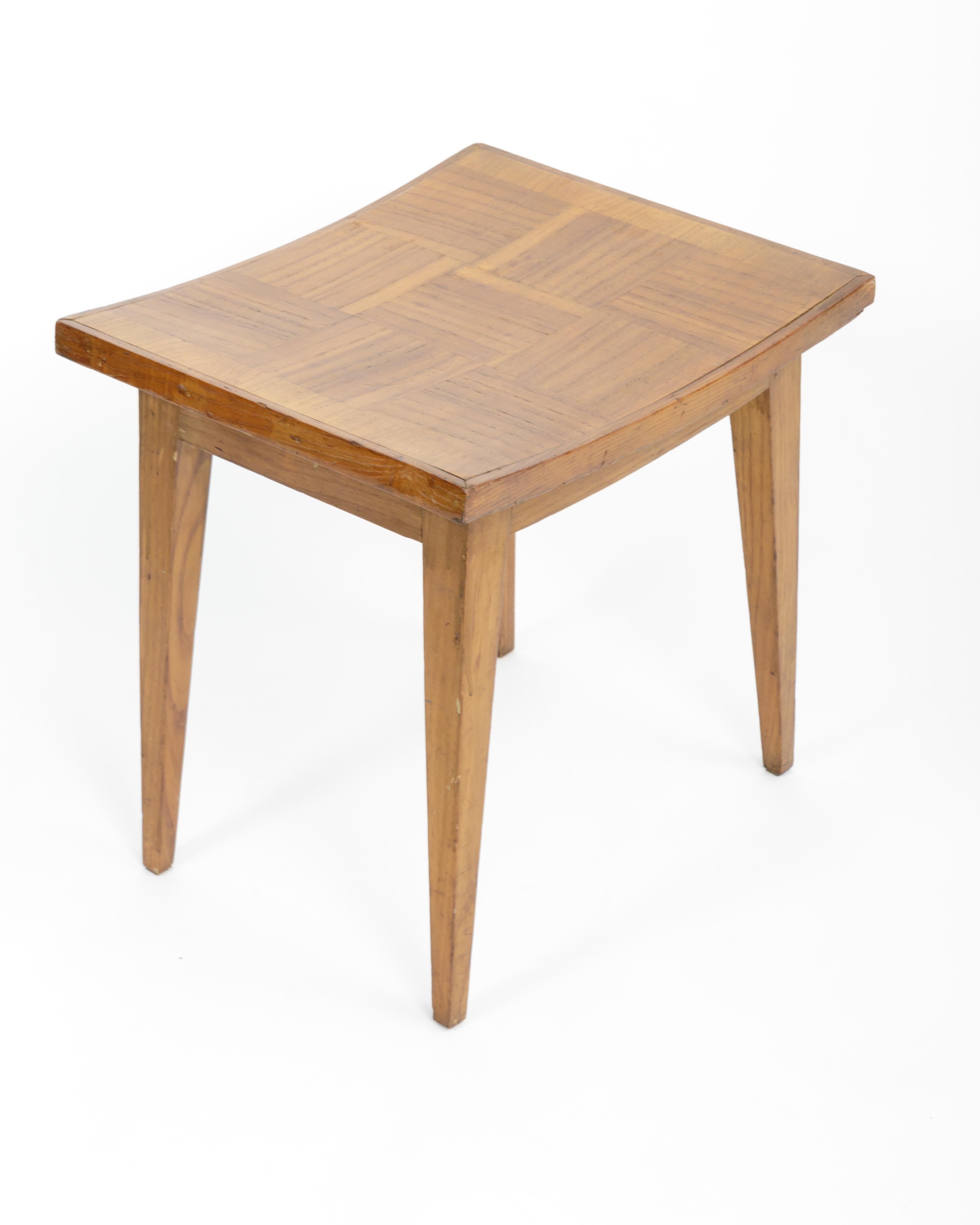 Modernist Wooden Stool Attributed to Gio Ponti, Italy, circa 1950s. 

Simple yet sophisticated in their design, these stools consist of a solid wood frame, four tapered legs, and an elegantly curved seat. 

Two available. Sold individually.