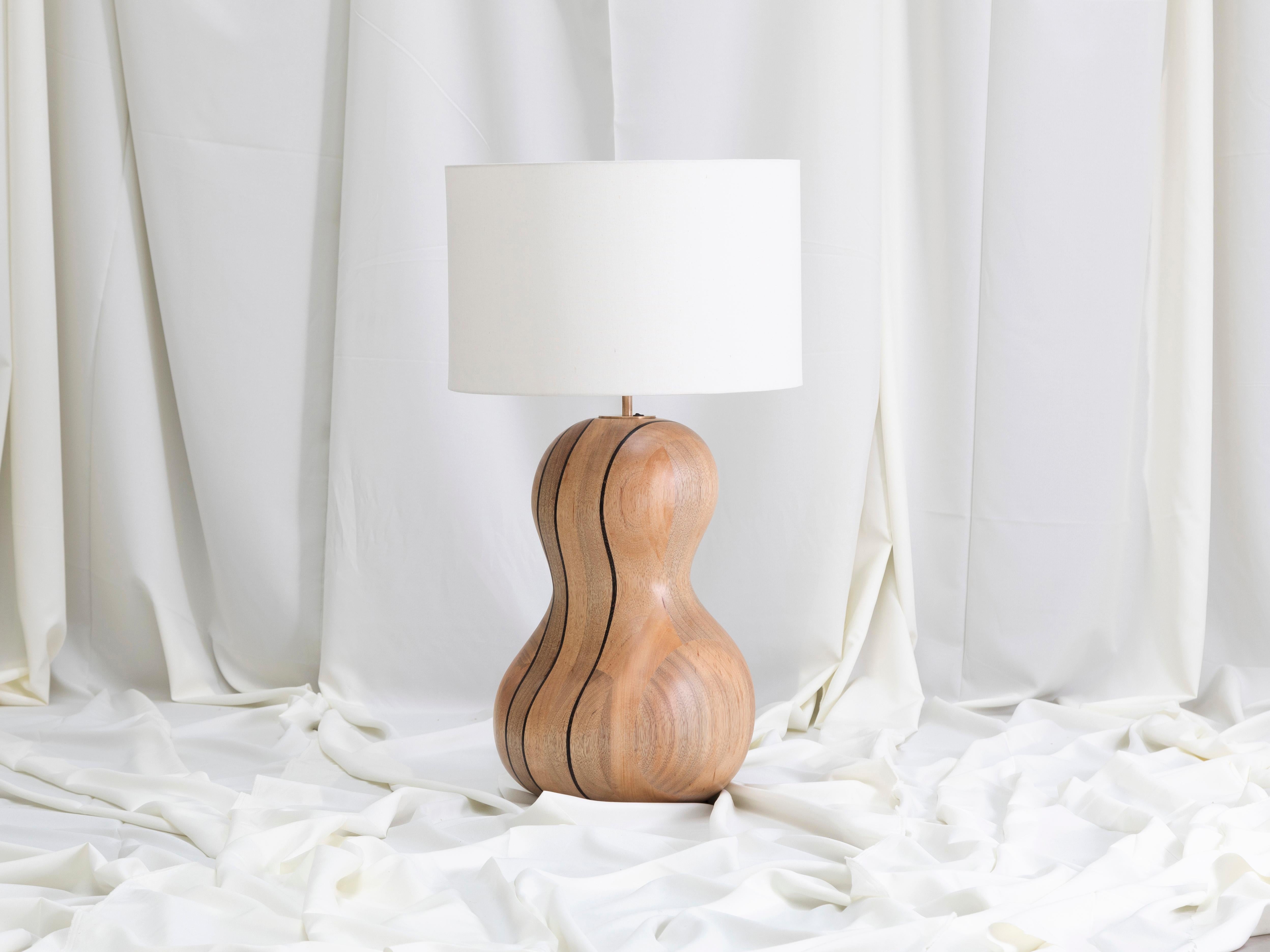 Curvita Table Lamp by Laluz
Dimensions: W 55 x D 55 x H 101 cm
Materials: Bronze, Chonta wood, Guarango Wood, Polyurethane, Textiles.
Weight: 22 kg.

LaLuz Design is a young, dynamic company that specializes in the production of unique 3D-printed