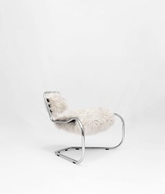 Curvy armchair designed by Luca Pasqualotti for Seconda Giovinezza 2024