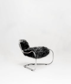 Curvy armchair designed by Luca Pasqualotti for Second Youth 2024