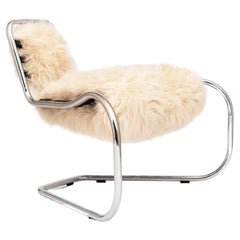 Curvy armchair designed by Luca Pasqualotti for Seconda Giovinezza 2024