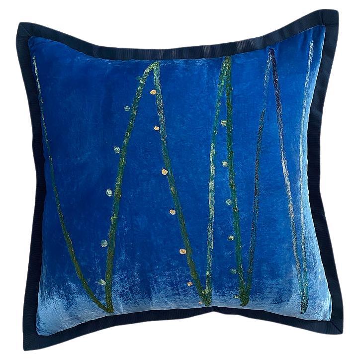 blue velvet square pillow with gold leaf details
