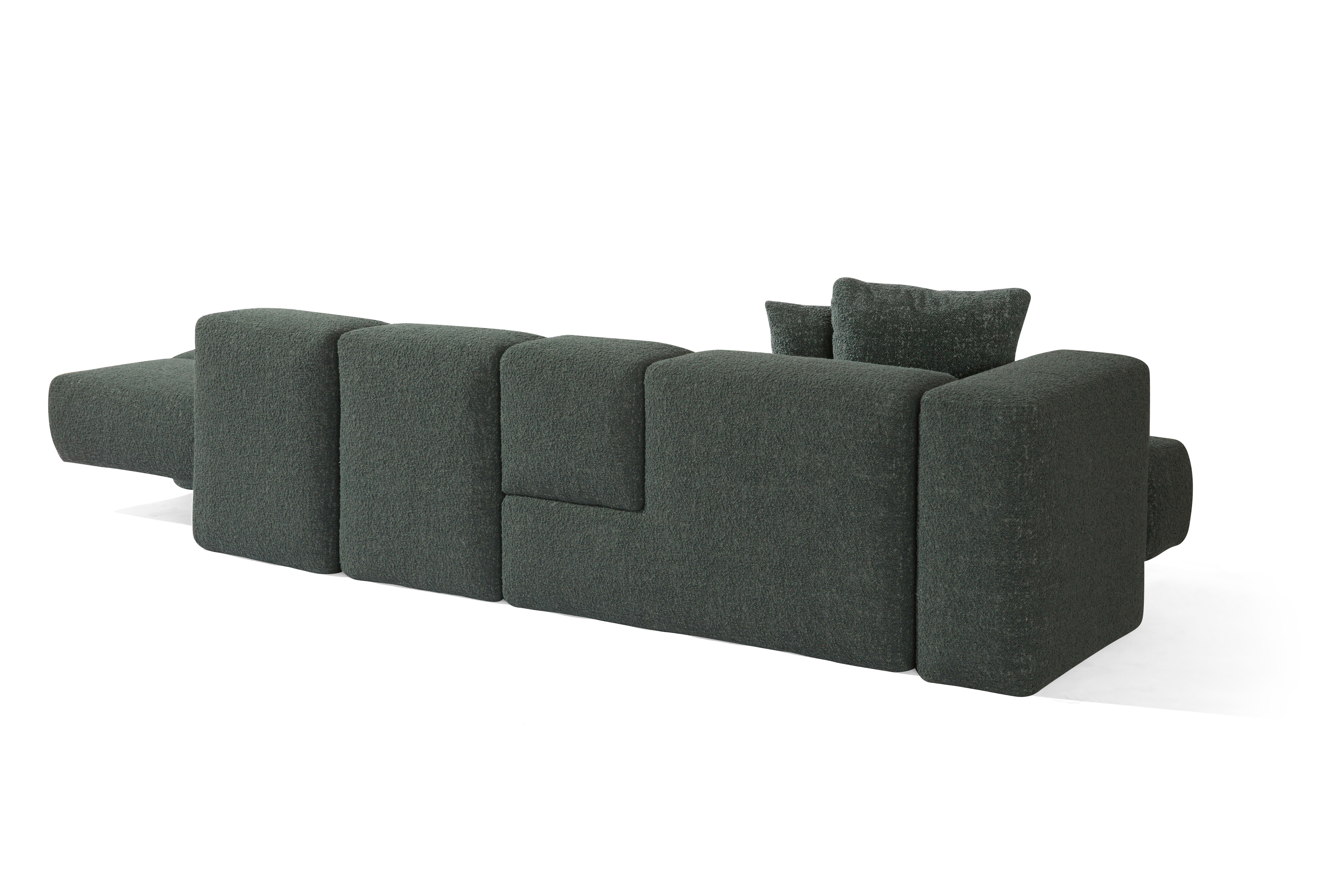 The three seater modular sofa is distinguished by different compositions that characterized every single module. The movement created by the different shapes of the modules makes the sofa a unique and versatile piece adaptable to any environment.
