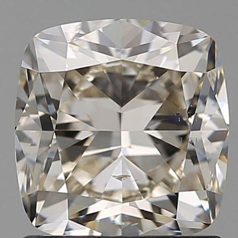 
This exquisite 1.50-carat cushion-cut diamond is a timeless masterpiece of brilliance and elegance. Certified by the Gemological Institute of America (GIA), it guarantees exceptional quality and authenticity. Featuring a highly desirable L color