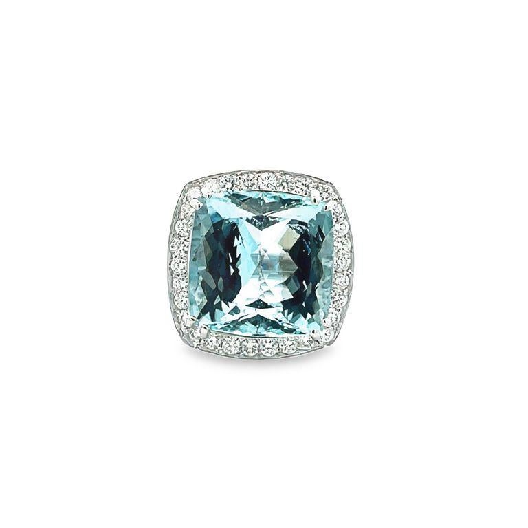 Our cushion ring will undoubtedly captivate your heart with its stunning aquamarine gemstone that glimmers with every movement. The centerpiece of this magnificent ring features a remarkable 15.50-carat aquamarine that is elegantly surrounded by