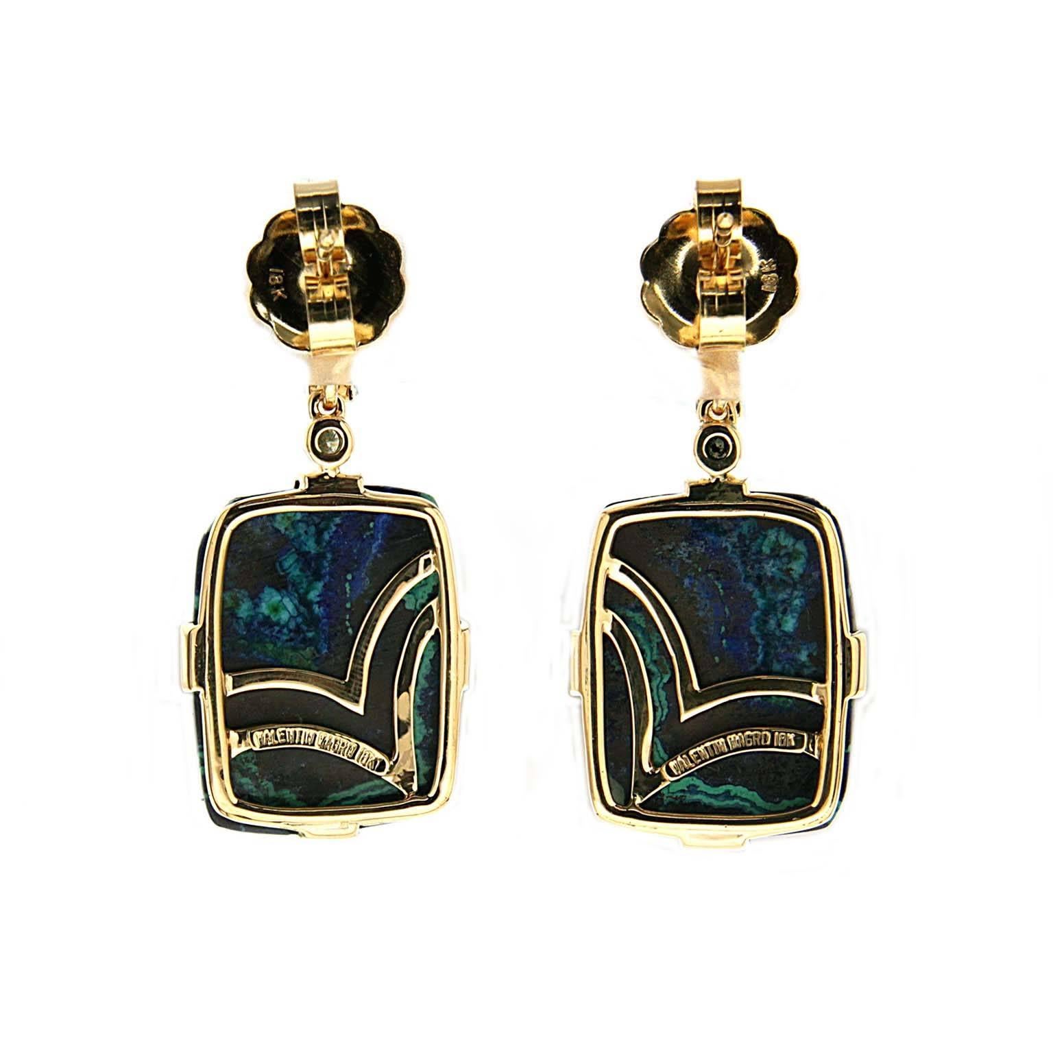 These lovely earrings feature blue cushion Topaz and trapezoid Azurite Malachite with rectangle pave motif in 18kt yellow gold. They are finished with clip-backs (post can be added upon request).
