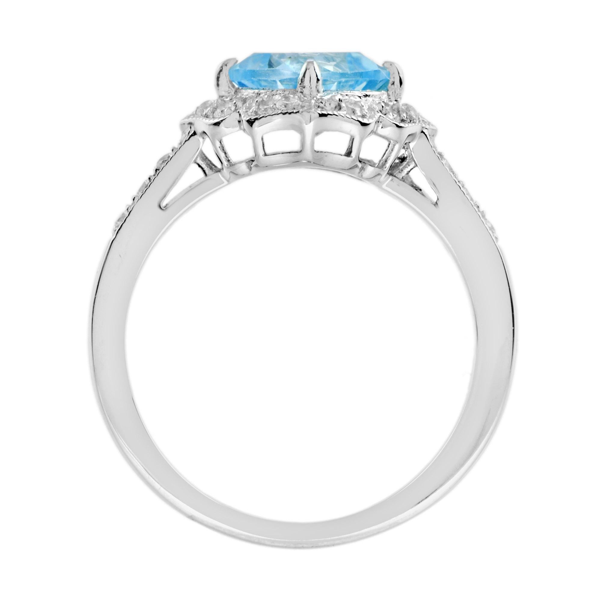 Anello di fidanzamento aureolato in oro bianco 14K con topazio blu e diamanti in stile vintage In condizioni Nuovo in vendita a Oakton, VA