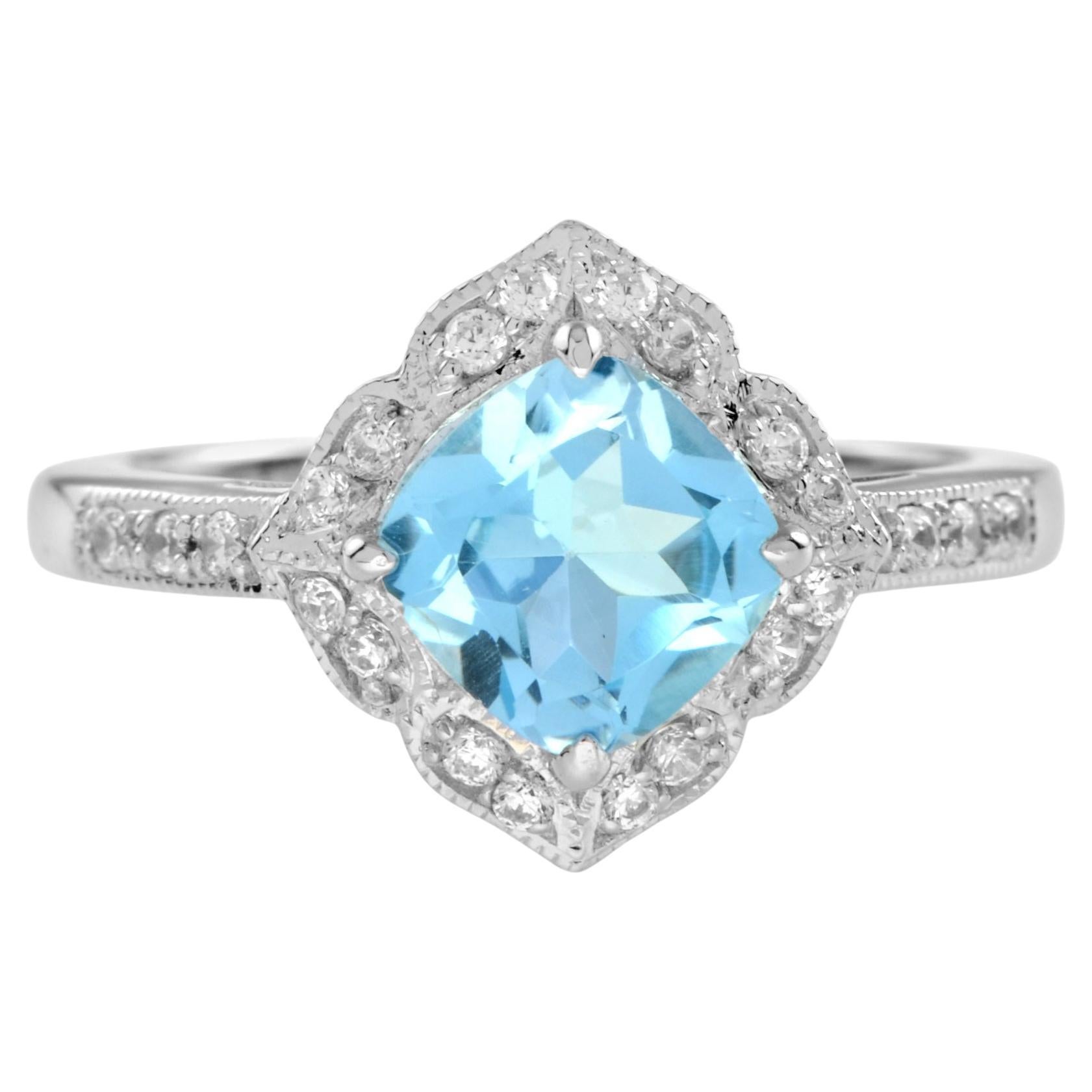 Anello di fidanzamento aureolato in oro bianco 14K con topazio blu e diamanti in stile vintage in vendita
