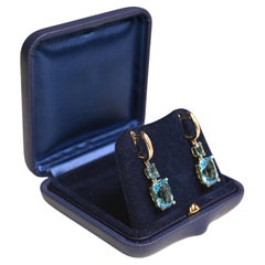 Ohrringe mit blauem Topas im Kissenschliff (ca. 10,50 Karat), 18 Karat Gelbgold
