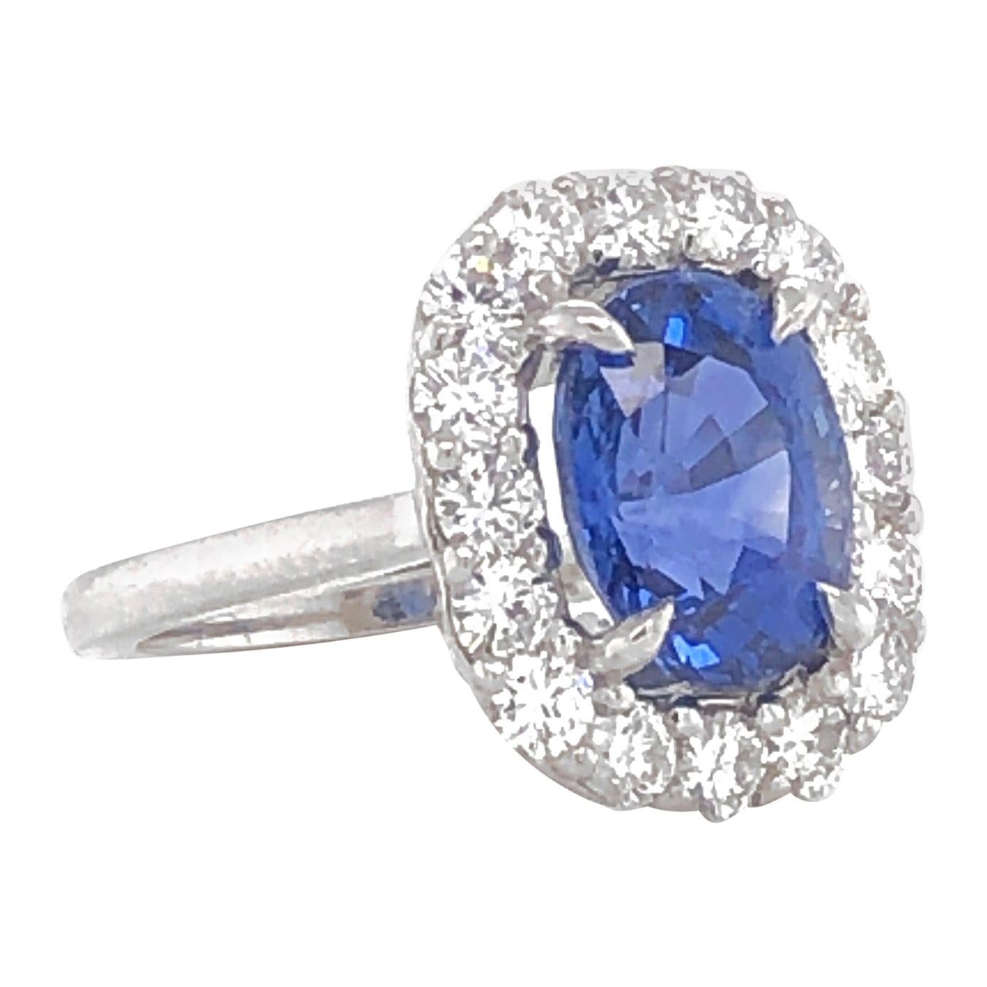 Cushion blue ceylon oval sapphire 4.69 ct round diamonds 1.28 ct platinum ring For Sale