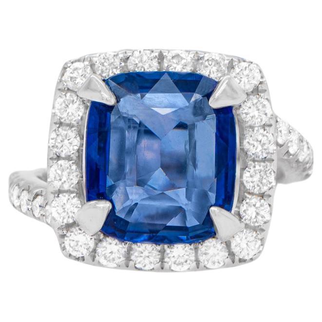 Cushion Cut 4 Carat Sapphire Ring with Diamond Halo 0.80 Carats Total 18k Gold For Sale