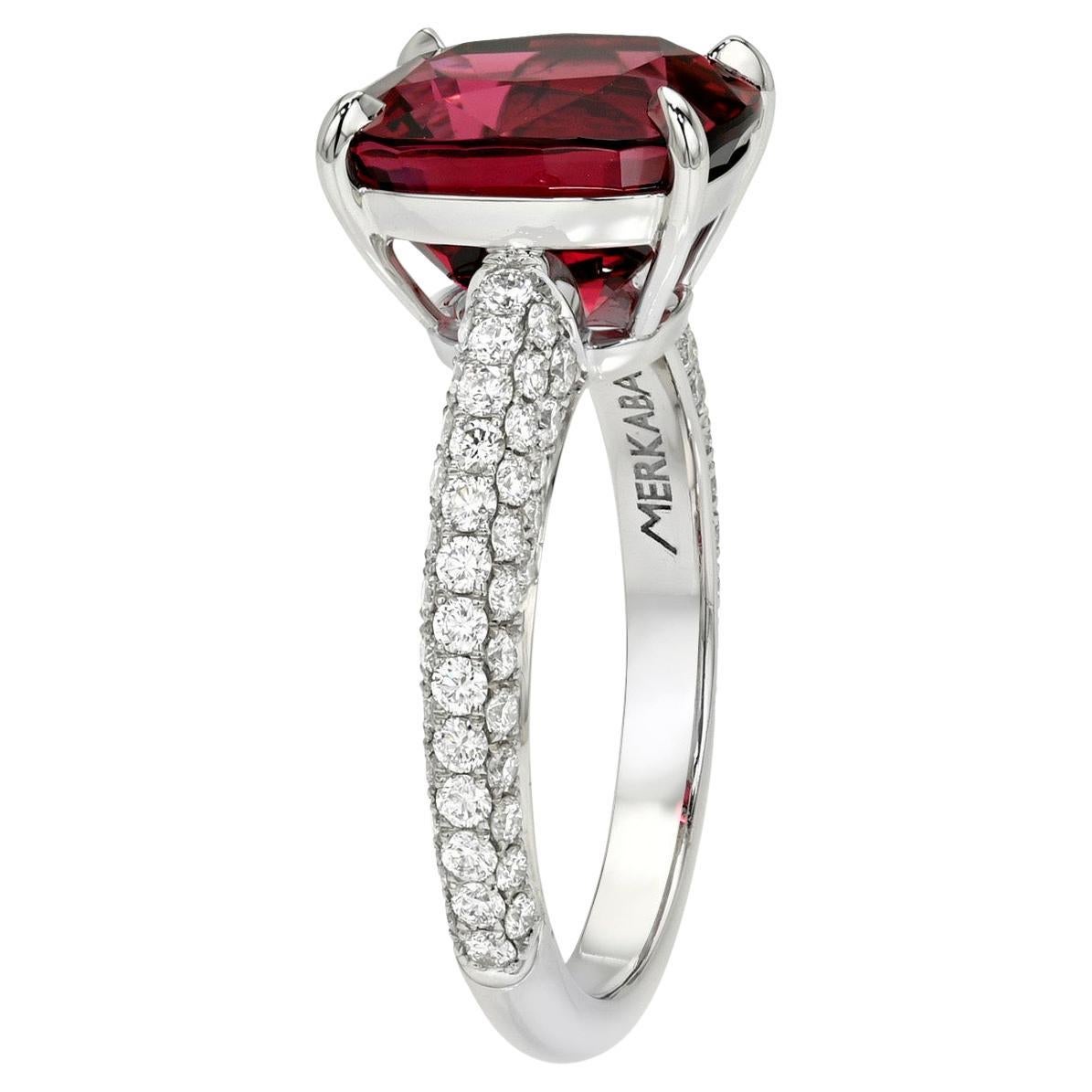 Romantic 5.13-Carat Cushion Burma Red Spinel Engagement Ring in Platinum with Pavé Diamonds. An Heirloom of Eternal Passion – Merkaba Jewelry Beverly Hills.

Step into a world where passion meets purpose and beauty becomes legacy. This exquisite
