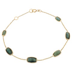 Pulsera de cadena con zafiro azul talla cojín en oro amarillo de 18 quilates