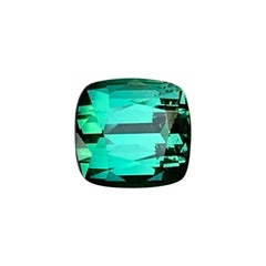 Gema de turmalina natural de color verde azulado con corte «cushion», ideal para anillos y colgantes