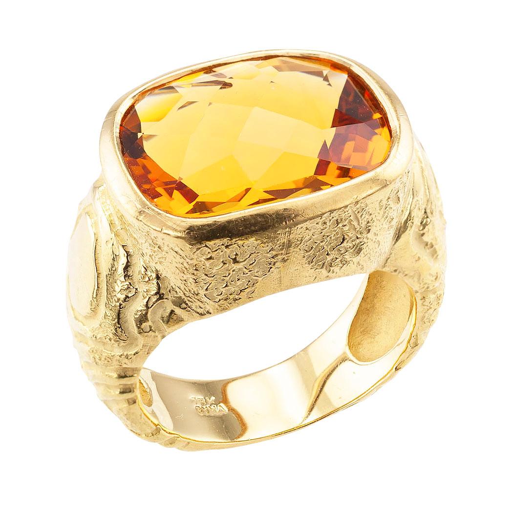 Cushion cut Citrine and yellow gold ring by Cyma circa 1990.

DETAILS:
GEMSTONES: one cushion shape checkerboard-cut citrine.
METAL: 18-karat yellow gold.
HALLMARKS: signed Cyma.
RING SIZE: 6 ¾, can be sized.
WEIGHT: 14.3 grams.
MEASUREMENTS: